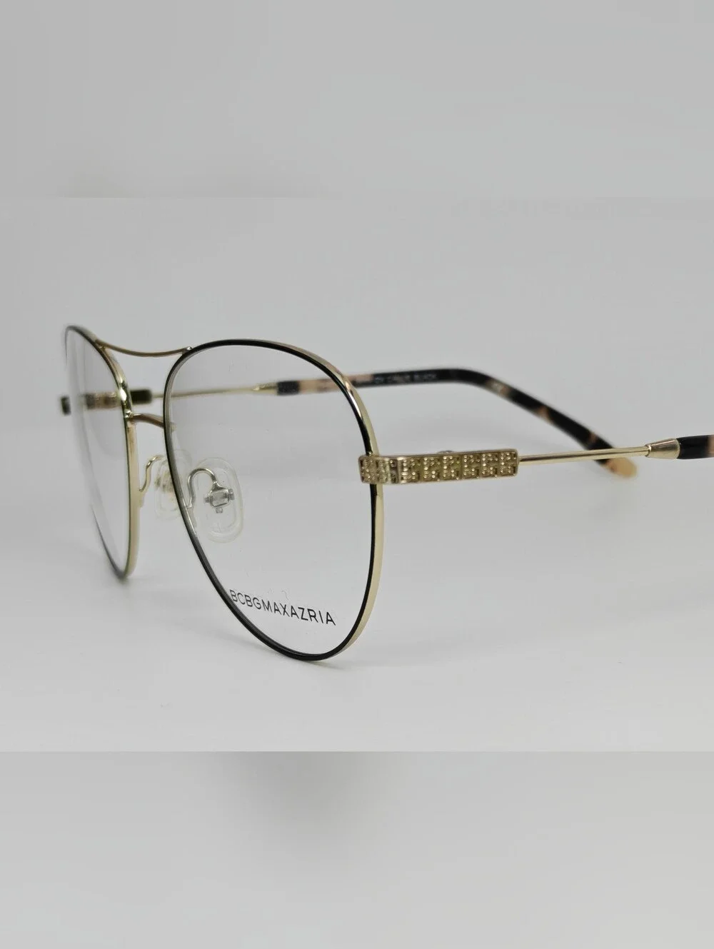 BCBGMAXAZRIA Call Aviator Eyeglass Frames in Black and Gold. Feminine.